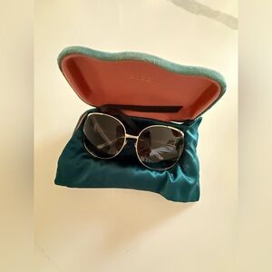 Gucci Gold Frame Sunglasses with Black Lenses